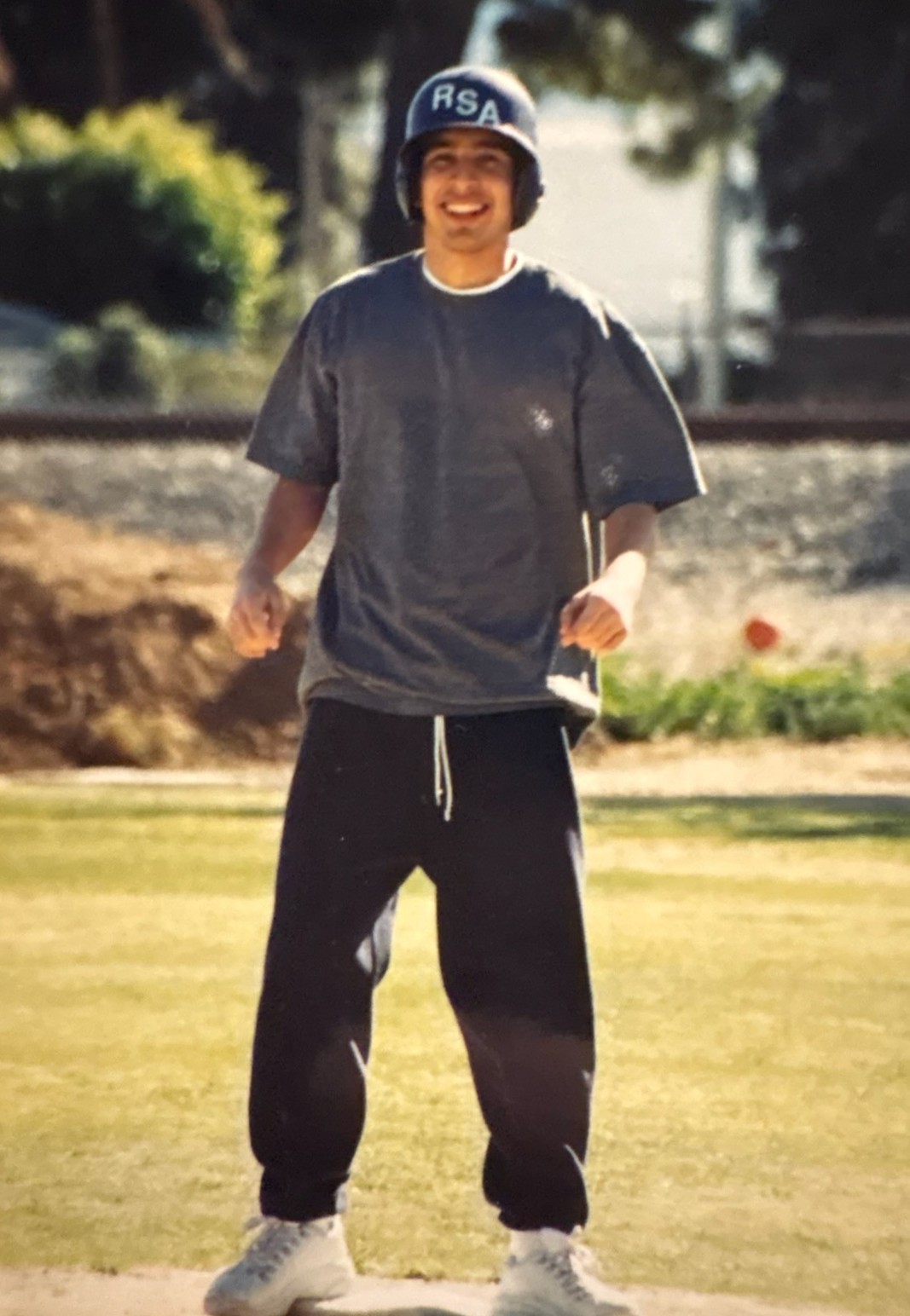 Isaac playing baseball